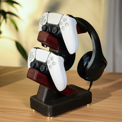 Gaming controller and headset on a wooden stand with a blurred background
